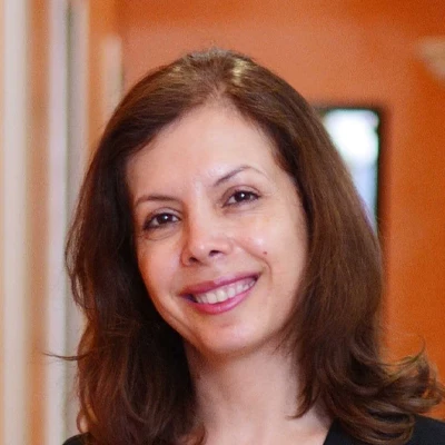 Dentist Fatima Jelini is displayed to introduce herself to potential patients